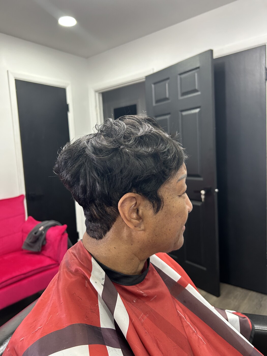 Short curled style with soft defined waves