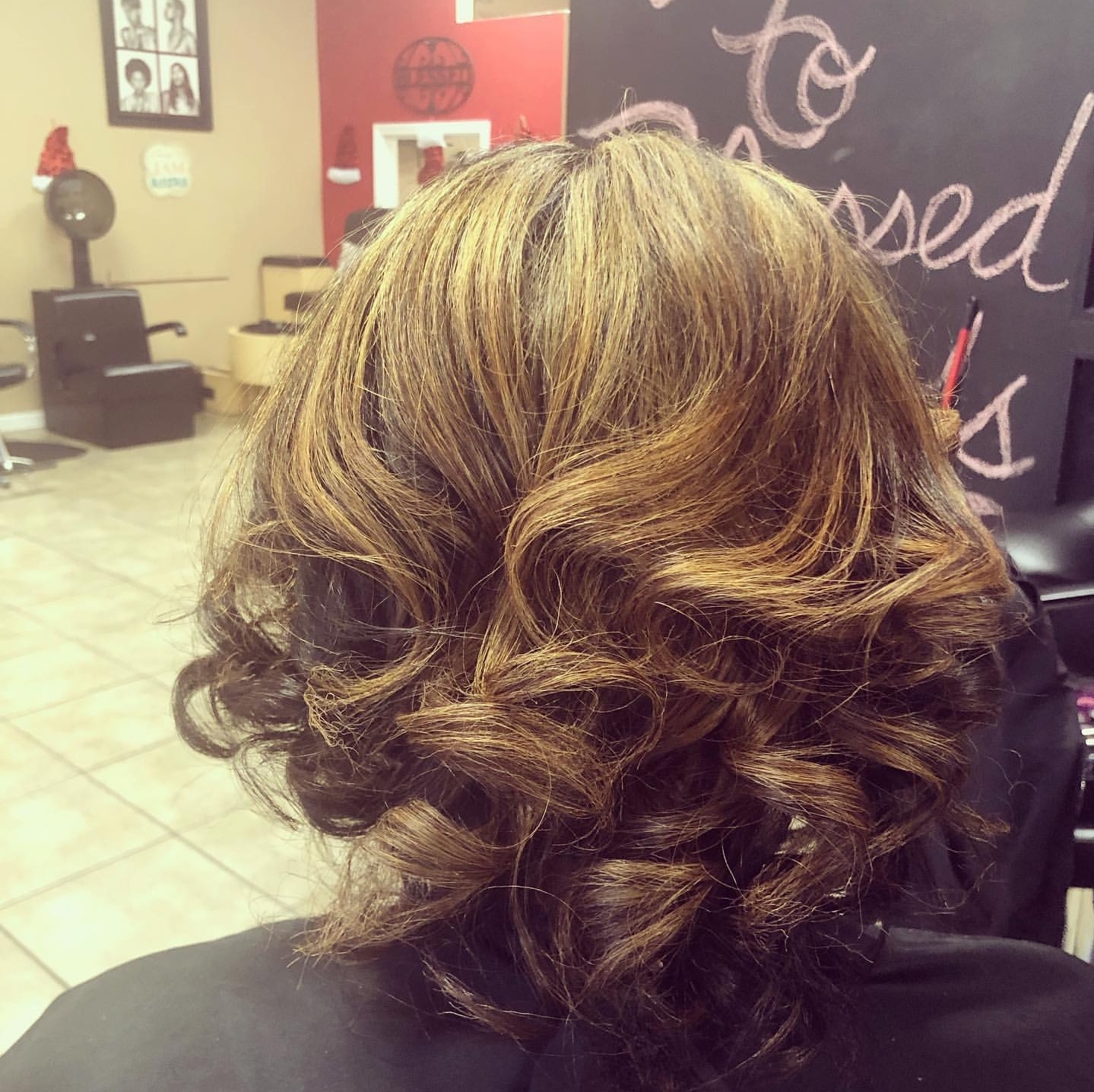 Honey-toned color with full curled styling